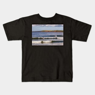 Surfing at Manorbier in Pembrokeshire Kids T-Shirt